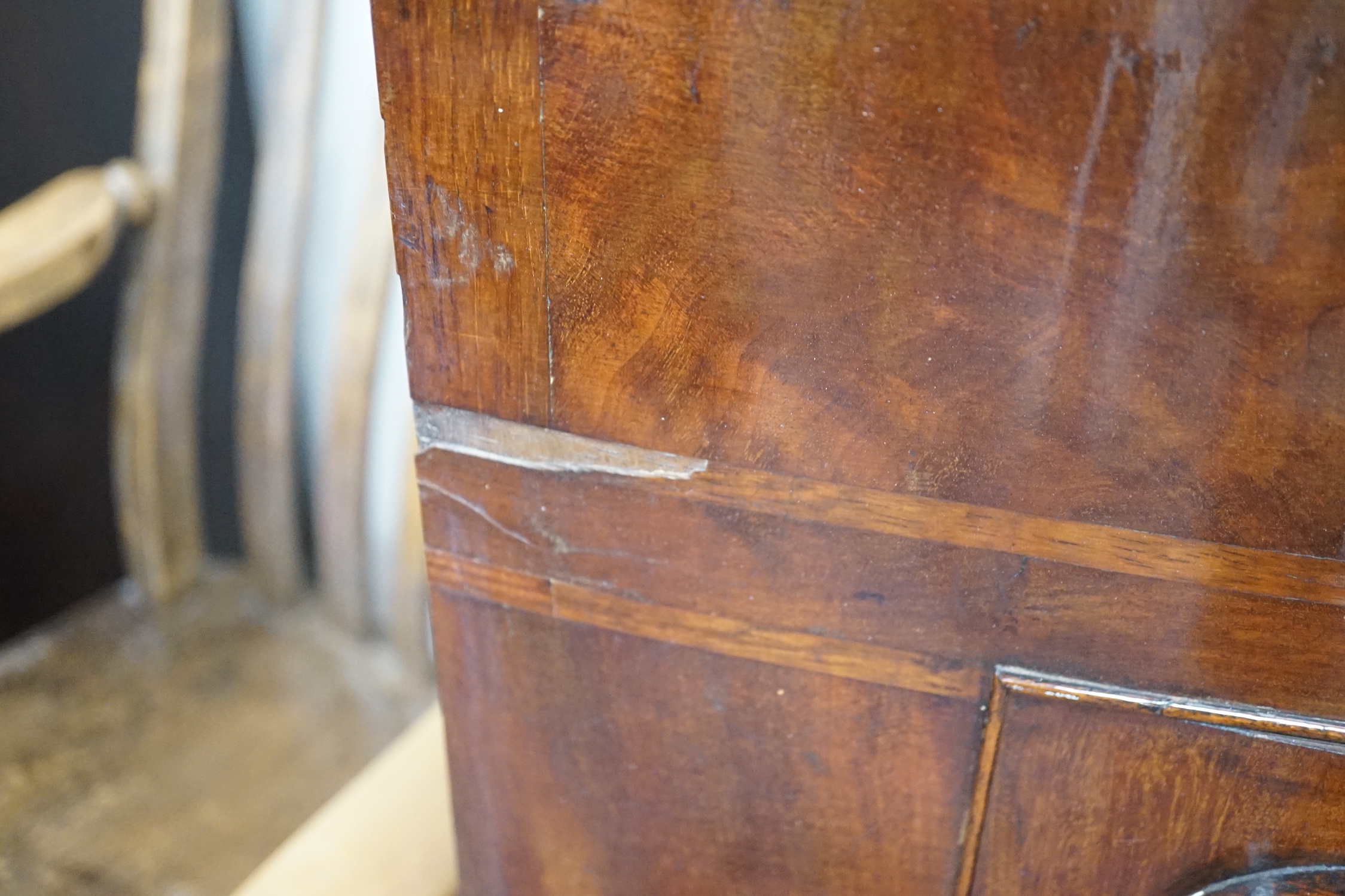 A Victorian mahogany bowfront hanging corner cupboard, width 93cm, depth 49cm, height 126cm
